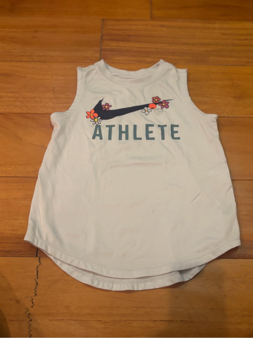 Nike White Tank Top with Navy Floral Swoosh and 'ATHLETE' Text